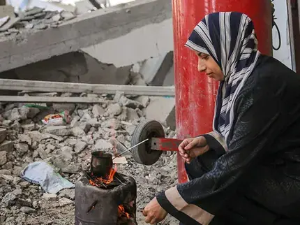 UN Women spoke with three generations of women from one family in Gaza, who have endured war, displacement, and uncertainty for decades. Kholoud Al Gourani, 28 recounts the horrors with a heavy heart: "This war defies all comprehension. We never imagined we would lose our homes, our cherished memories, and our loved ones. Displacement has become our constant reality." Gaza. September 2024. Photo: UN Women/Suleiman Hajji.
