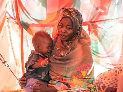 Rabha, a beneficiary of UN Women's humanitarian assistance at Saada and Salaam gathering site in Port Sudan. Through women-led organizations across the country, UN Women gives various forms of humanitarian support to the women and girls of Sudan including psychosocial, provision of dignity kits and sensitization on their rights. (Photo: UN Women/Ekram Hamad Fadlalla)
