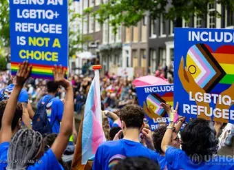  LGBTIQ+ refugees and asylum seekers from all over the world celebrate Pride on UNHCR’s boat during the Canal Parade of Pride Amsterdam. 