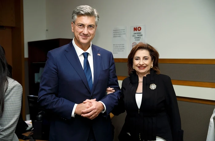 UN Women Executive Director Sima Bahous poses with the Prime Minister of Croatia at an indoor event.