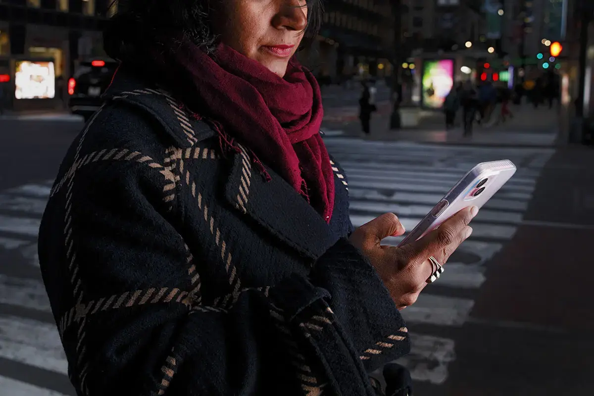 Technology-facilitated violence isn't just about what happens on screens. What happens online spills into real life easily and escalates. (Stock photo posed by model). Photo Illustration: UN Women/Ryan Brown.