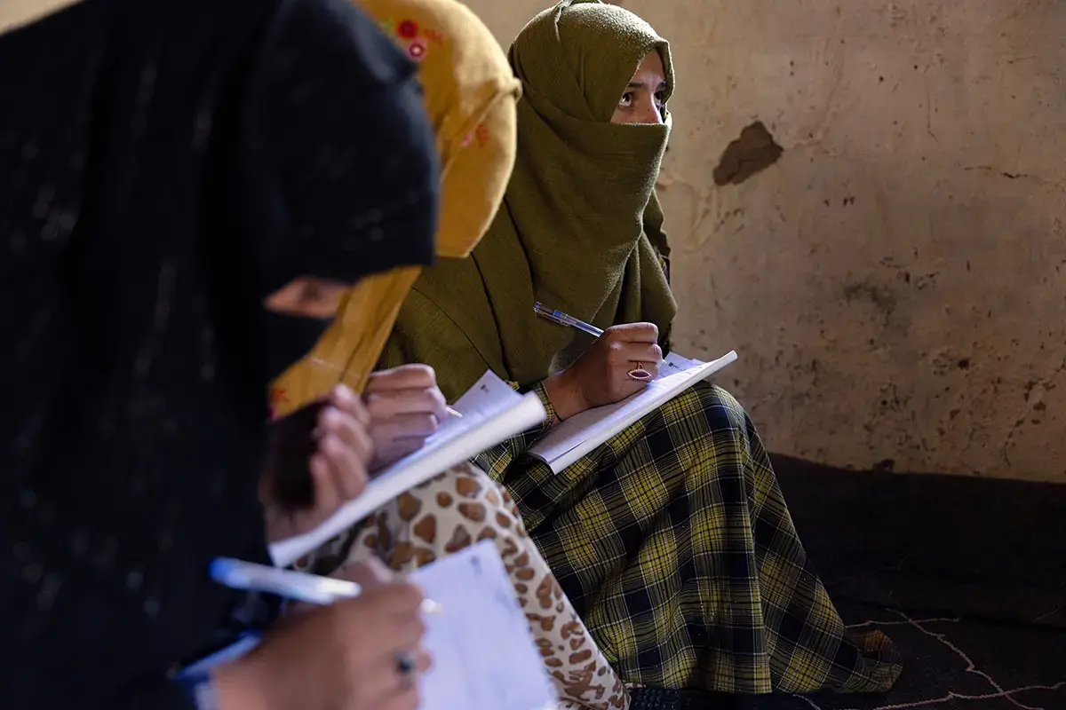 Women are learning to read and write thanks to a literacy initiative supported by UN Women in the province of Nuristan, in eastern Afghanistan