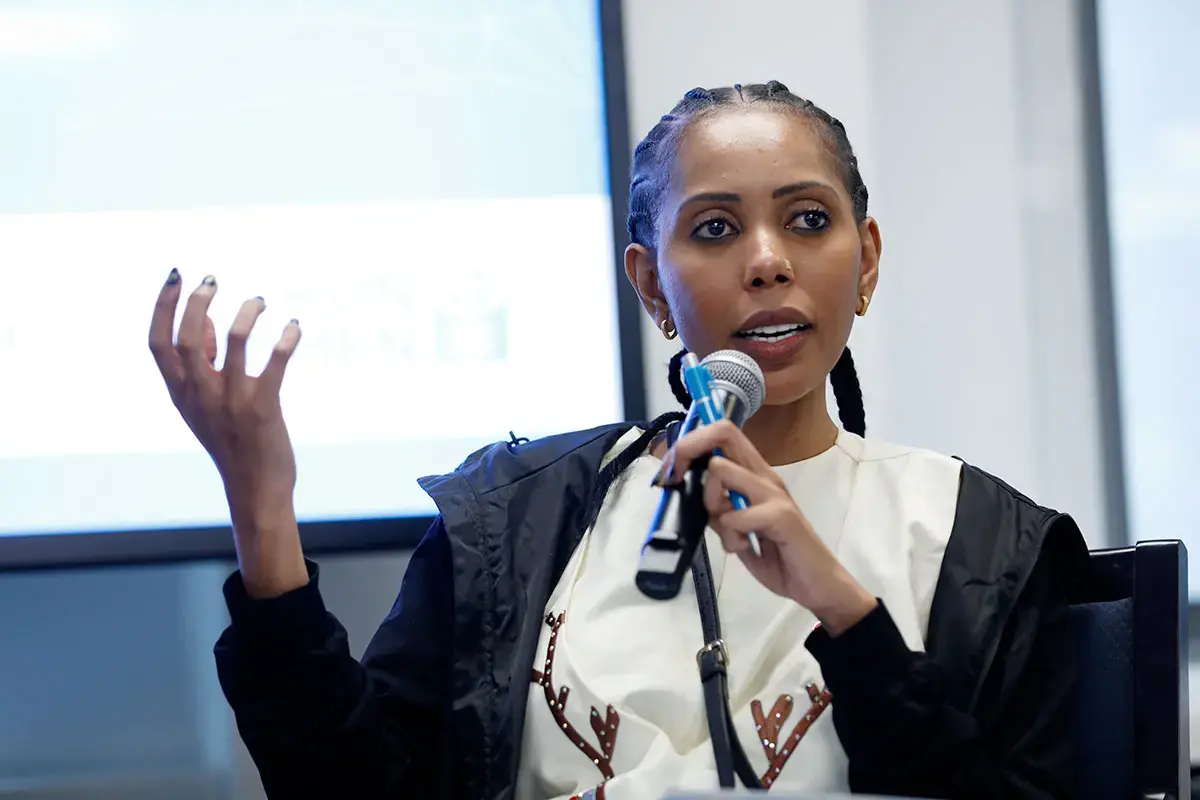 Jaha Dukureh, UN Women Goodwill Ambassador for Africa addresses the event “Promising practices to prevent online violence against women in public and political life” held at UN Women headquarters on 25 September 2024. Photo: UN Women/Ryan Brown