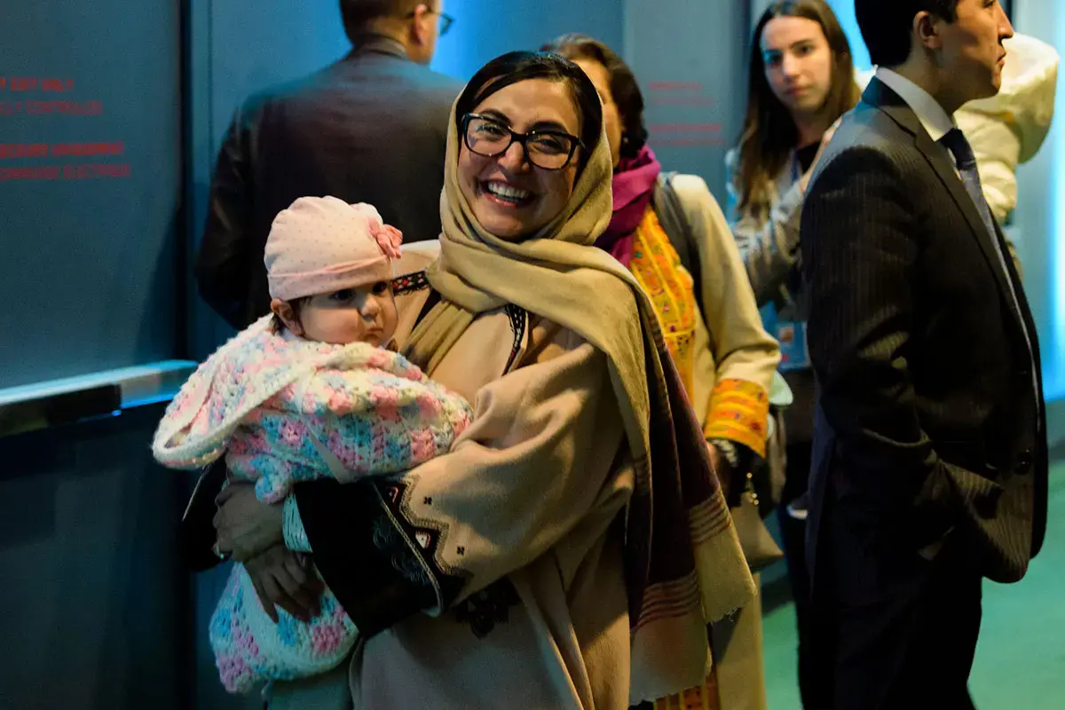 From 2001 to 2021, several women held significant public offices, including Adela Raz, who was appointed Permanent Representative of Afghanistan to the United Nations and then served as the Ambassador of Afghanistan to the United States. In 2019 she arrived at the United Nations with her daughter to attend the high-level meeting of the General Assembly on the occasion of the thirtieth anniversary of the adoption of the Convention on the Rights of the Child. Photo: UN Photo/Manuel Elias